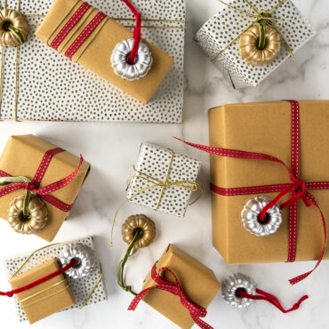 Ornaments wrapped on presents for a giftable scene