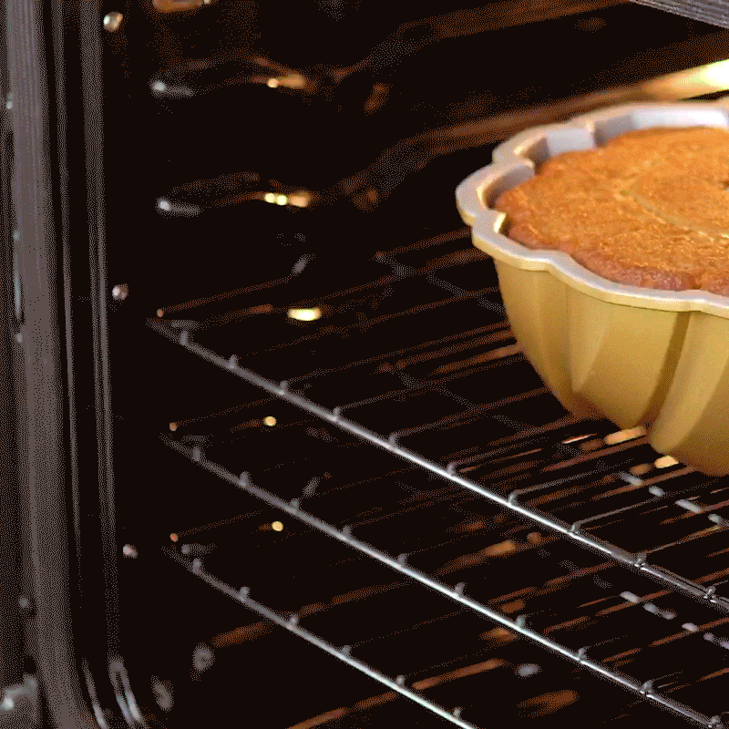 Hot pads GIF taking Bundt out of oven