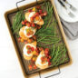 Nonstick High-Sided Oven Crisp Baking Tray  with baked chicken and green beans