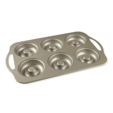 Make six donuts that are baked rather than deep-fried. Treat™ bakeware features a PFOA-free nonstick surface for easy release and quick cleanup whitesweep