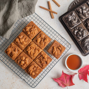 Seasonal Squares cakelets placed on cooling grid with one piece cut out