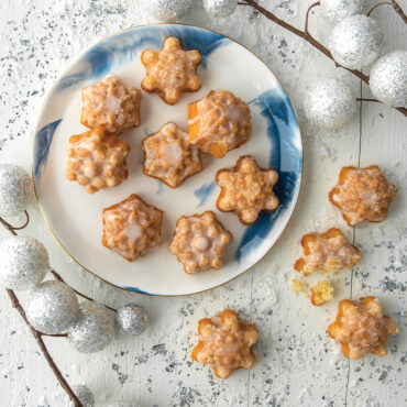 Baked frosty flake cake bites on a plate with snow decorations
