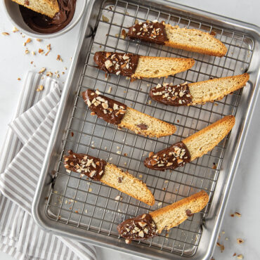 Biscotti's on cooling grid dipped in chocolate