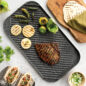 A overhead image of making steak tacos on the grill side of the reversible griddle.