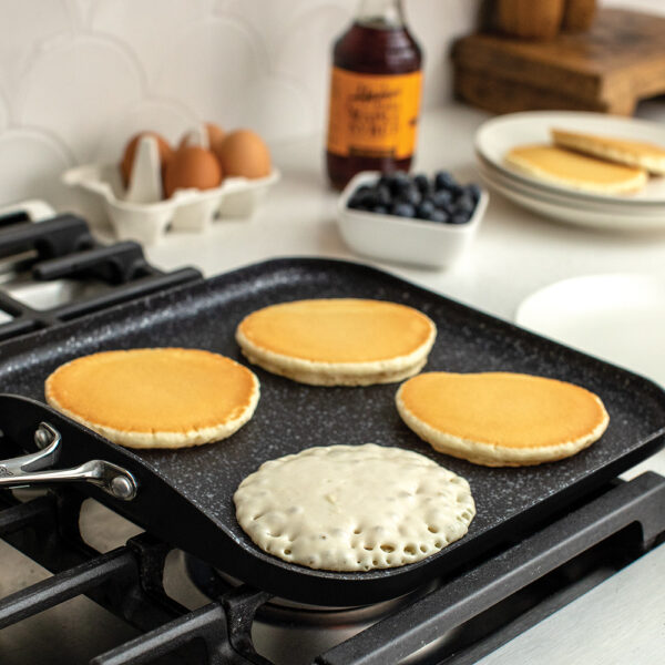 Indulge in the joy of cooking with our 11-inch square griddle. Its spacious surface and even heat distribution make it perfect for cooking up pancakes, grilled sandwiches, and so much more. Elevate your culinary skills with this essential kitchen tool.