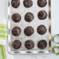 Chocolate cookies overhead on Naturals® Vintage Starburst Half Sheet Pan