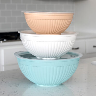 Stacked 6 piece bowl set with lids in kitchen
