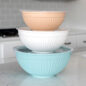 Stacked 6 piece bowl set with lids in kitchen