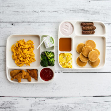 overhead images of kids breakfast and lunch meals on two divided meal trays