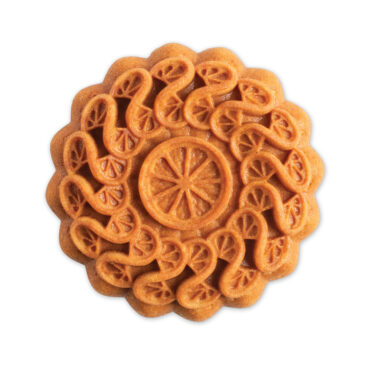 plain citrus twist cake against a white background