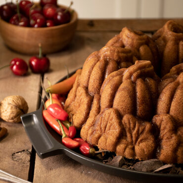 The image showcases the fall-like details of the pumpkin patch bundt cake.