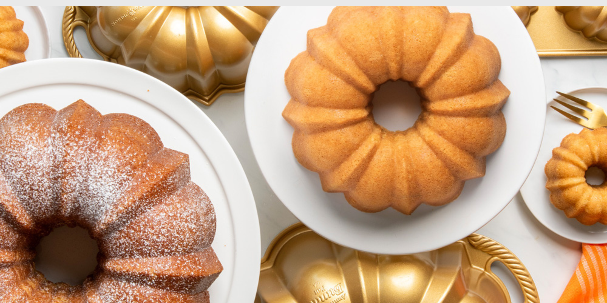 Collection of Anniversary Bundt® cakes and pans.