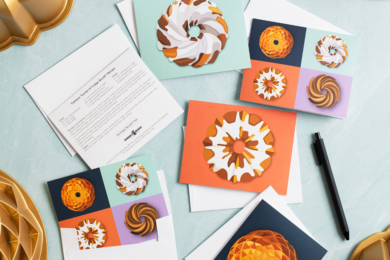 Bundt Notecards on a table about to be written. 