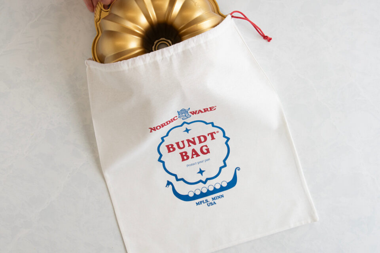 Anniversary Bundt pan being removed from a Bundt storage bag. 