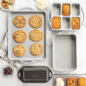 ProCast Everday Bakeare product group shot with baked cookies, mini loaf cakes - Baking scene
