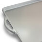 Closeup of elegant handle design on ProCast Baking Sheet