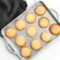 ProCast Half Sheet - A versatile and reliable half sheet pan designed for professional and home bakers. in this image you can see cookies have been baked on this half sheet.