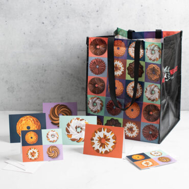 Group image of Bundt greetings cards with matching Bundt Reusable Tote Bag
