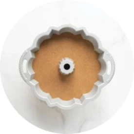 Fill pan 3/4 full and tap to remove air bubbles