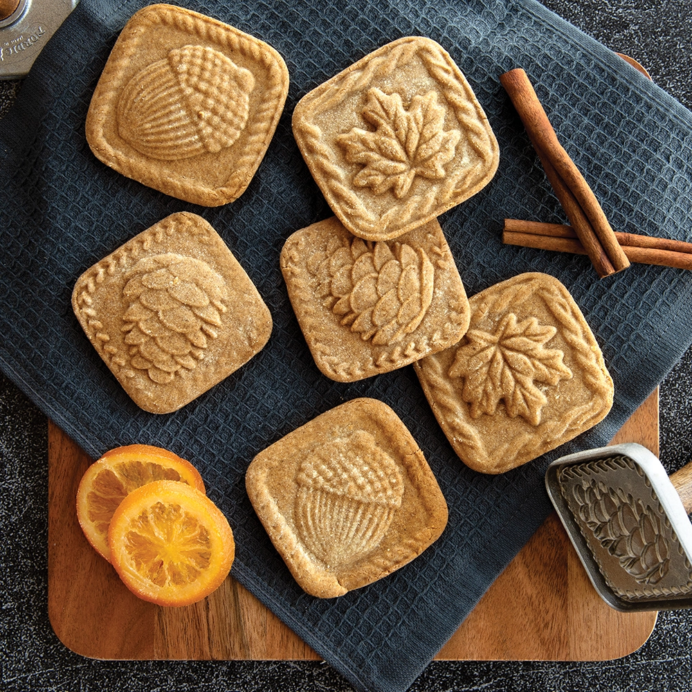 Image of baked fall spice shortbread cookies in Nordic Ware Fall Forest Cookie Stamp designs