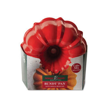 Nordic Ware 12-cup formed bundt pan in retail packaging with included vanilla bean cake mix box