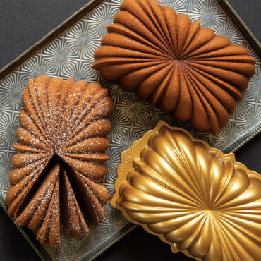 Two Fluted loaf cakes with fluted loaf pan
