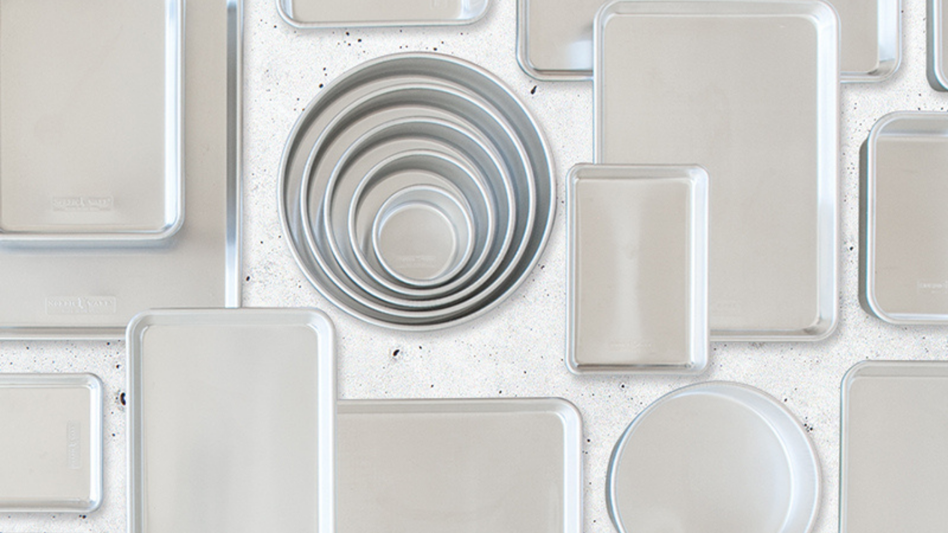 Nordic Ware’s Naturals® Aluminum Bakeware collection on countertop. 