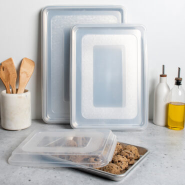 6pc Baking Sheets & Lids Set on countertop, Quarter Sheet filled with cookie dough balls