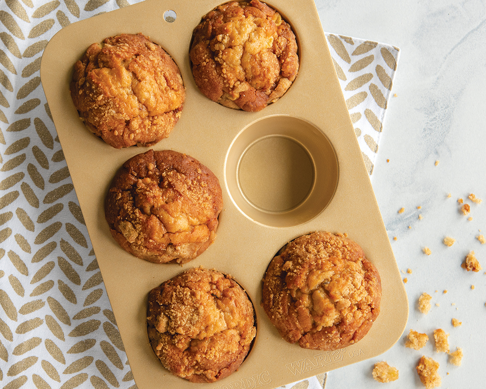 Compact Nonstick Naturals® Muffin Pan filled with muffins.