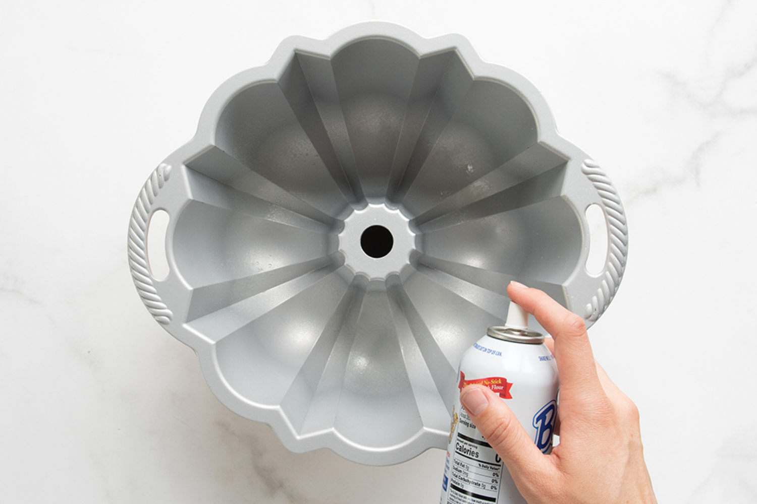 Baker's Joy Nonstick Baking Spray Prepping a Bundt Pan with Baker's Joy Nonstick Baking Spray