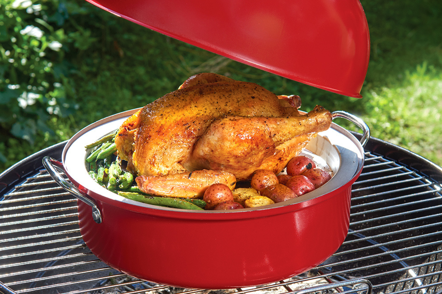 WHole chicken cooked on the grill in the Kettle Smoker.