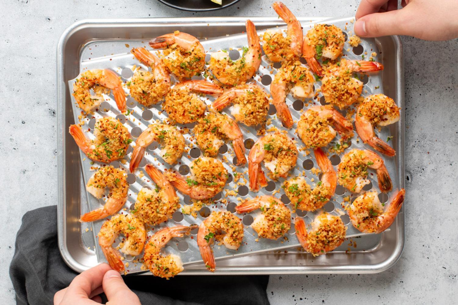 Naturals® Quarter Sheet with Multi-Task Oven & Cooling Rack with roasted shrimp on it. 
