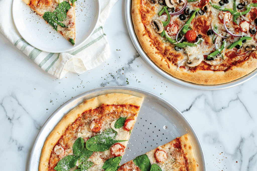 Pizza Pan Buying Guide: Solid vs Perforated vs Stone – Which Gets the Crispiest Crust at Home?