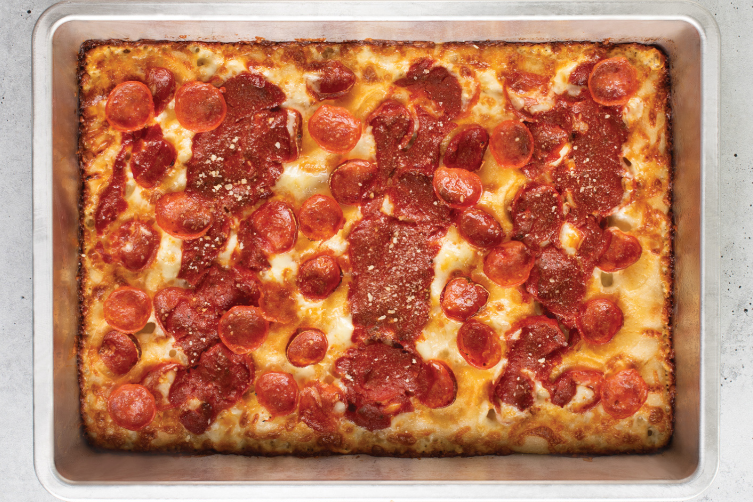 Detroit Pizza Pan with classic pepperoni Detroit Pizza baked in it. 