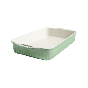 cardamom aluminum baking pan with green exterior coating and white interior nonstick finish