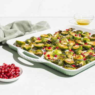 cardamom large baking sheet with baked brussel sprouts with red berries