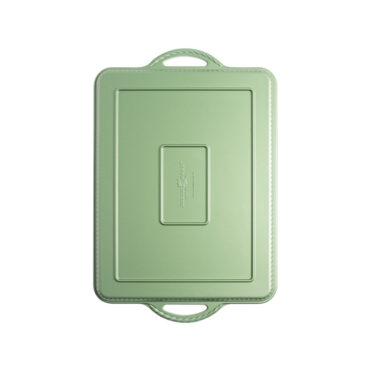 overhead view of cardamom large baking sheet showing green exterior coating