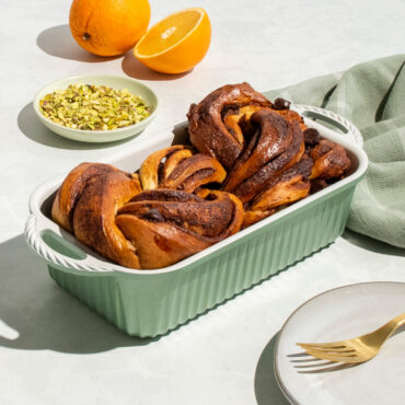 golden babka bread with swirled filling baked in cardamom loaf pan