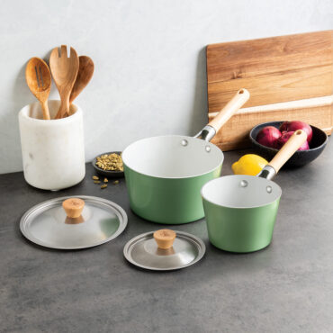 cardamom 3.5qt and 1.5 qt saucepans with lids on countertop