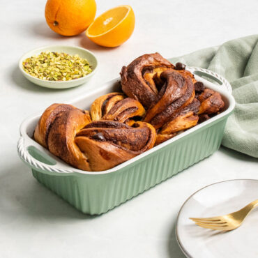 cardamom loaf pan with twisty loaf bread