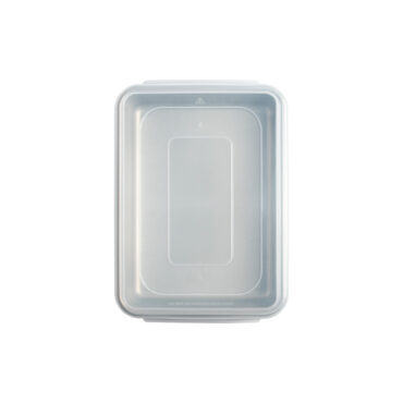 overhead of brilliant 9x13 pan with lid on white background