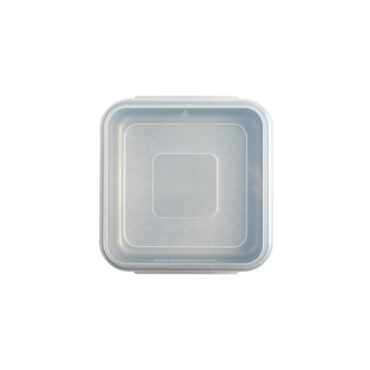 overhead of brilliant 9in square cake pan with lid on white background