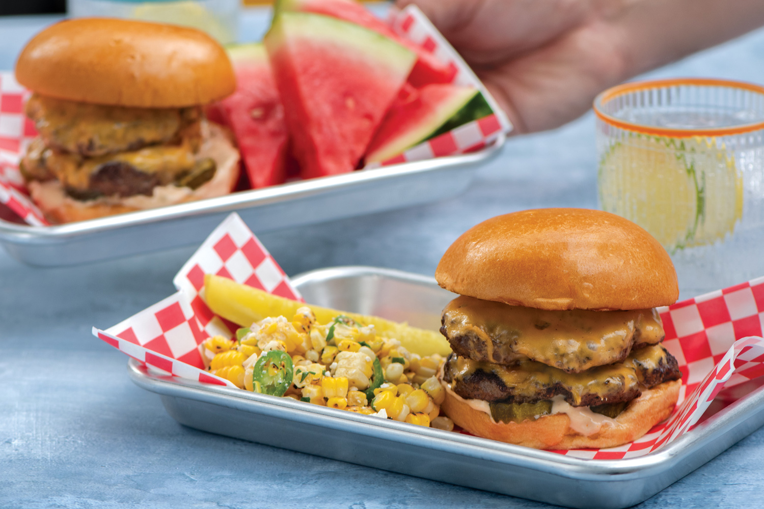 Burgers served on Nordic Ware Burger trays. 