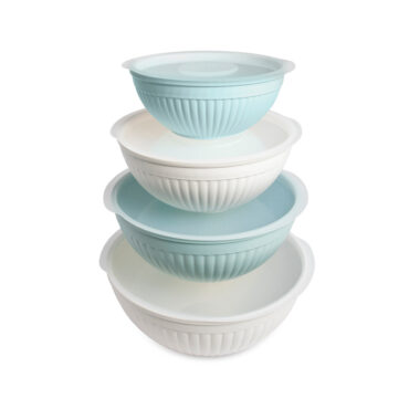 8 piece covered bowl set stacked on a white background