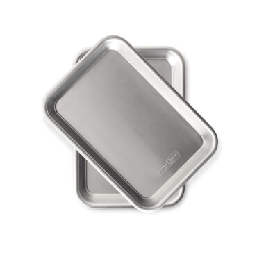 overhead of two burger serving trays on white backround