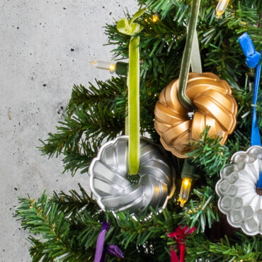 Bundt Ornament Group - a collection of stunning Braided Gold and Silver ornaments beautifully arranged together, showcasing elegance and charm hanging on a christmas tree.