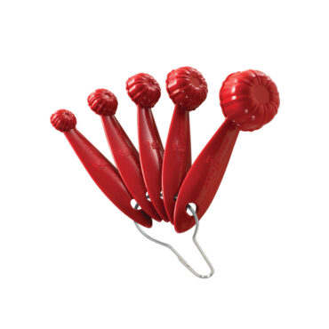 Set of 5 Nordic Ware Bundt measuring spoons in red, nested together showing fluted design