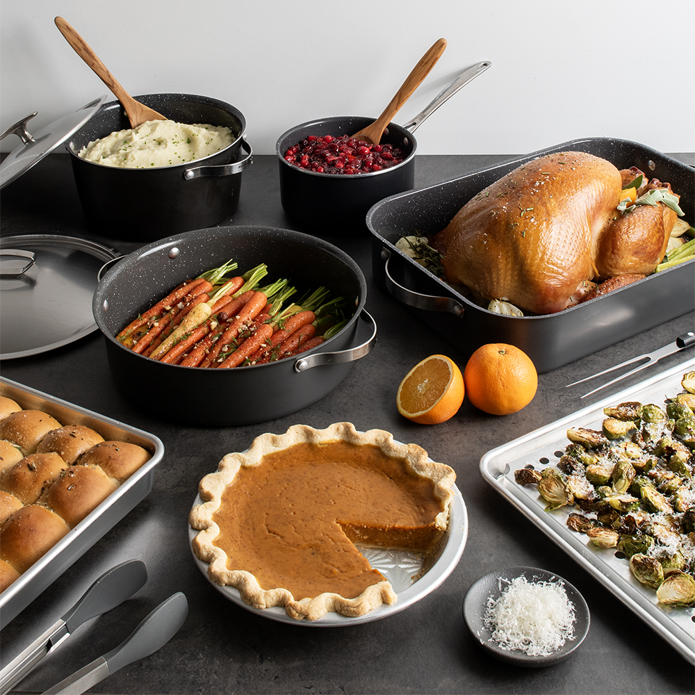 Image of Nordic Ware New Ceramic Nonstick Roaster with cooked Thanksgiving turkey